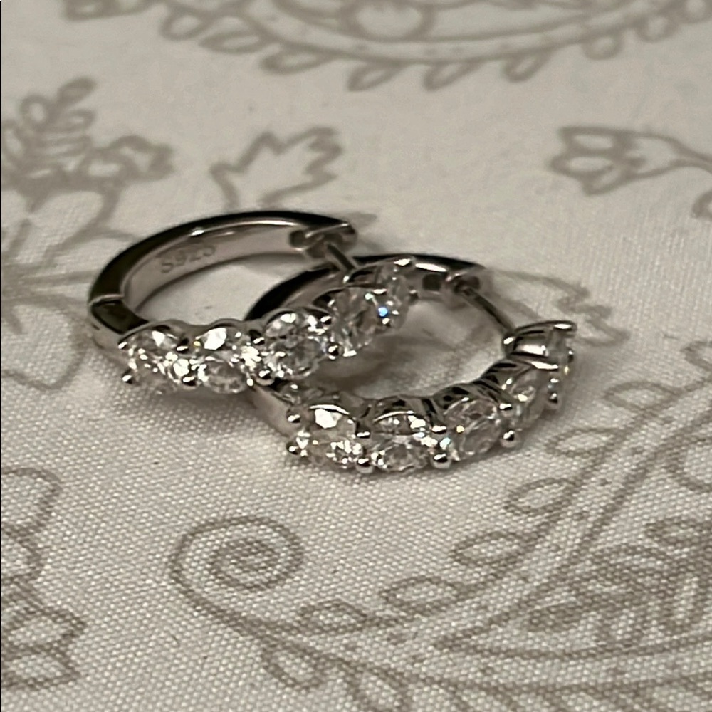 Elegant moissanite Silver Earrings with Sparkling Stones and Delicate Design